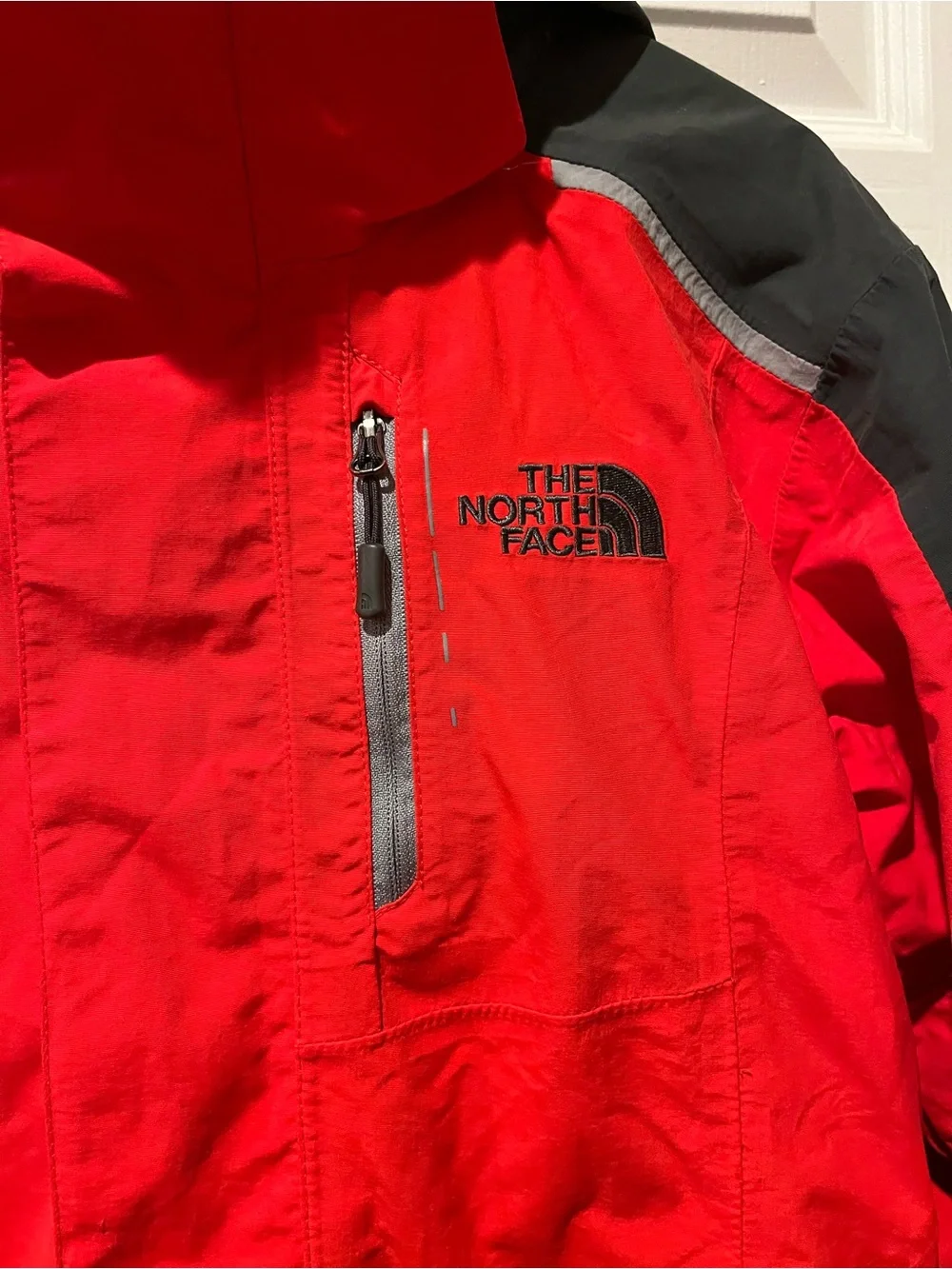 The North Face Red and Black Hooded Outdoor Jacket